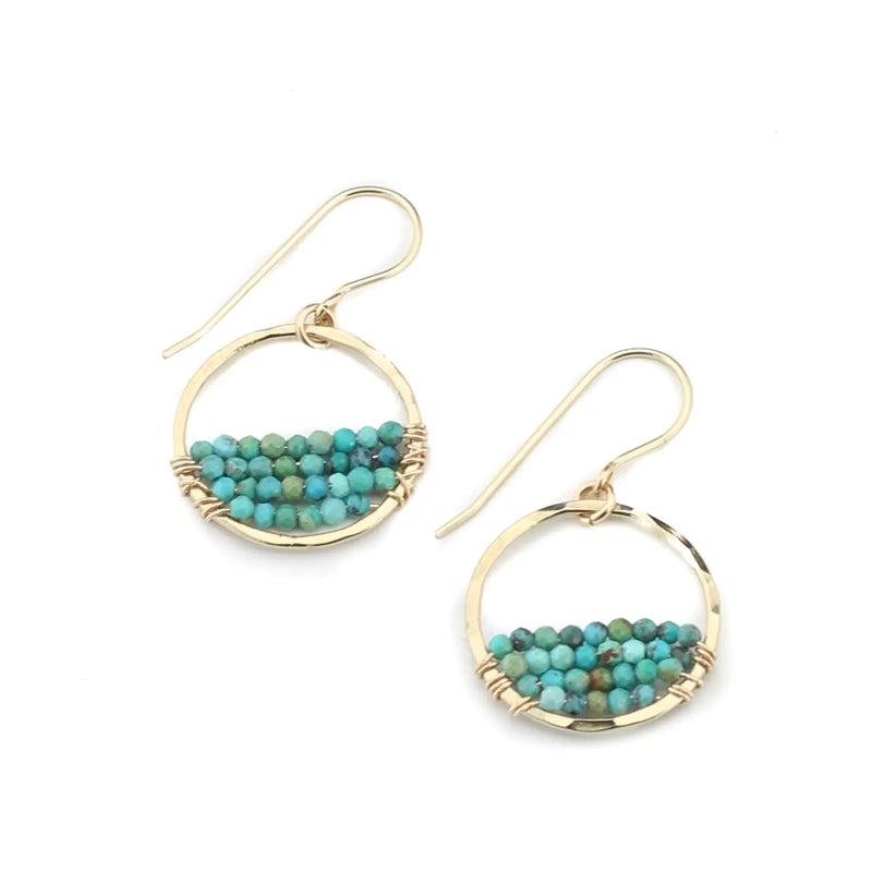Gold-filled hoop earrings with turquoise bead accents, Amy Joy Seaside Earrings, displayed on a white background.