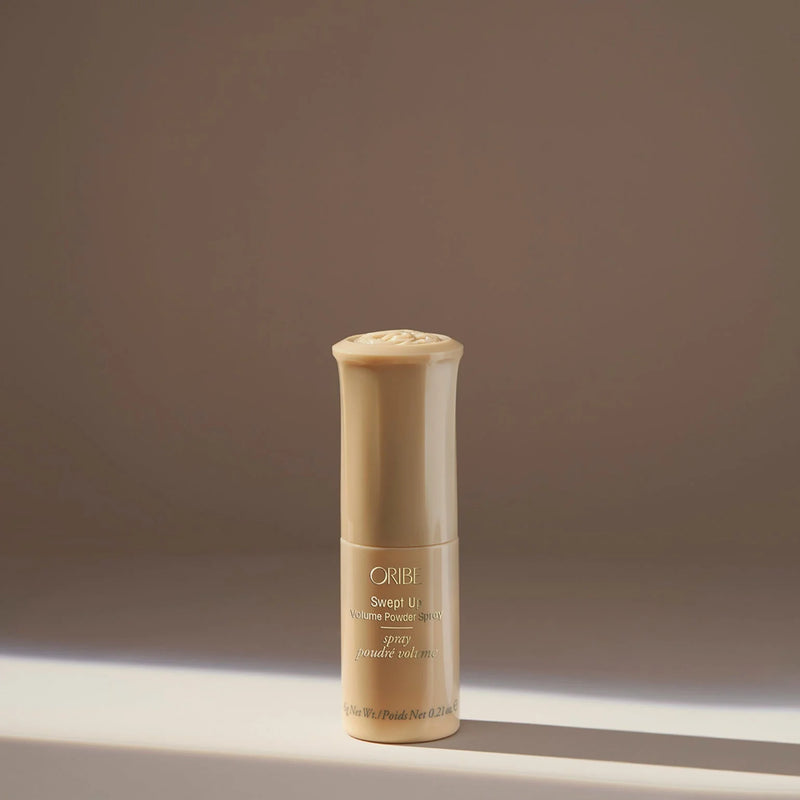 Oribe Swept Up Volume Powder Spray – precision sprayer with tapioca-starch root lift powder, instant weightless volume, grip and texture for fine hair, zero-mess application.
