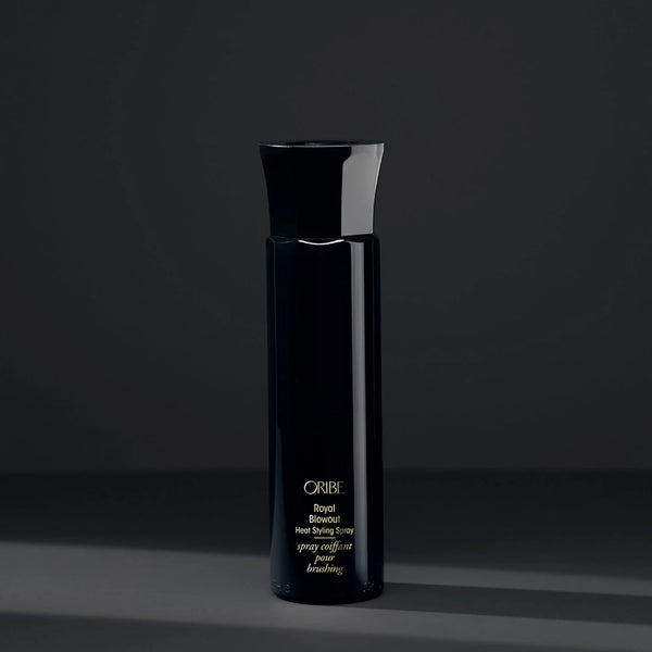 Oribe Royal Blowout Heat Styling Spray – ultra-lightweight sleekening mist with argan oil, ceramides and silicone complex; smooths frizz, seals split ends, speeds blow‑dry and adds body & shine.