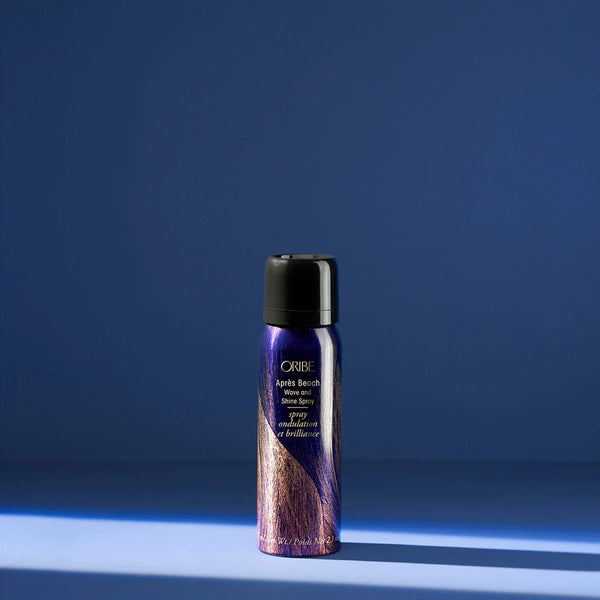 Oribe Travel Size Après Beach Wave & Shine Spray – mini styling mist that creates lightweight, tousled waves with sun‑kissed shine and soft hold, enriched with wheat protein, safflower oil and Oribe Signature Complex.