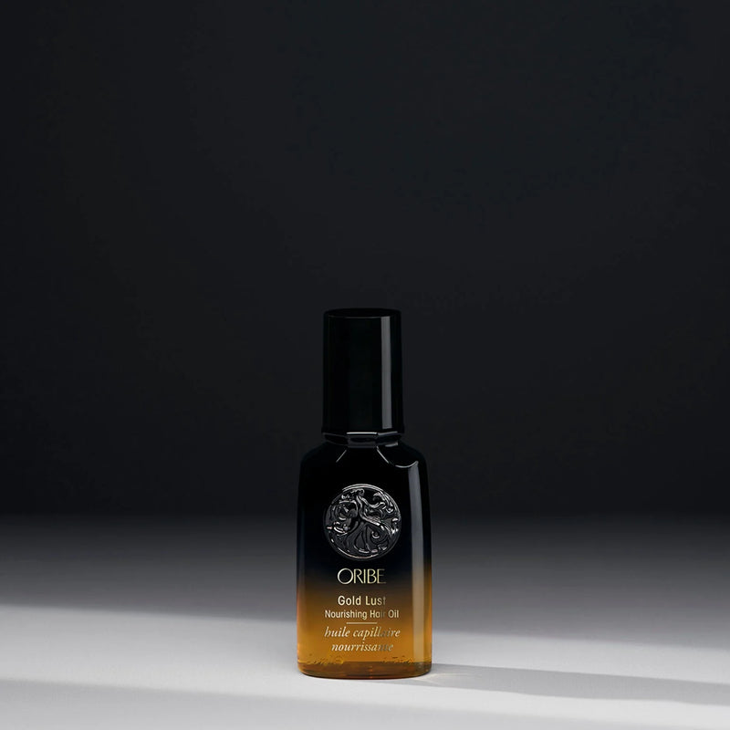 Oribe Gold Lust Nourishing Hair Oil travel size – lightweight argan oil hair treatment with jasmine, lychee, edelweiss and cassis extracts for smooth shine and frizz control.