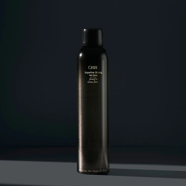 Oribe Superfine Strong Hair Spray – ultra-fine aerosol mist delivering sheer, strong hold with natural shine, lightweight and brushable, enriched with Pro‑Vitamin B5 and Signature Botanical Complex.