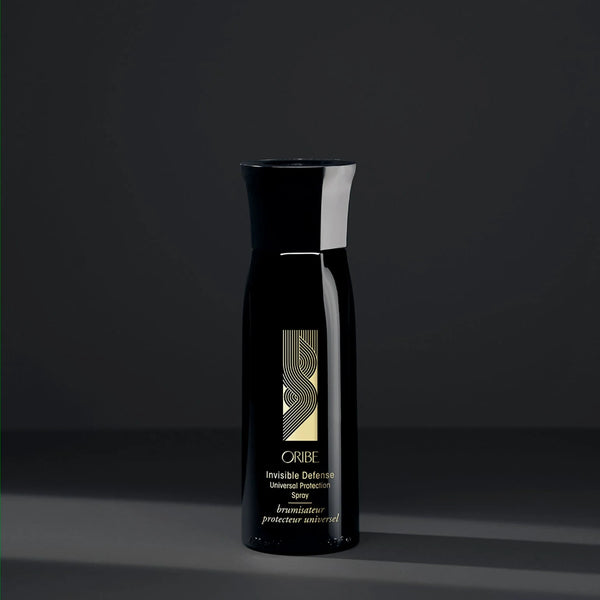 Oribe Invisible Defense Universal Protection Spray – weightless mist shields hair from up to 450 °F heat, UV rays and pollution while adding light moisture and fighting frizz.