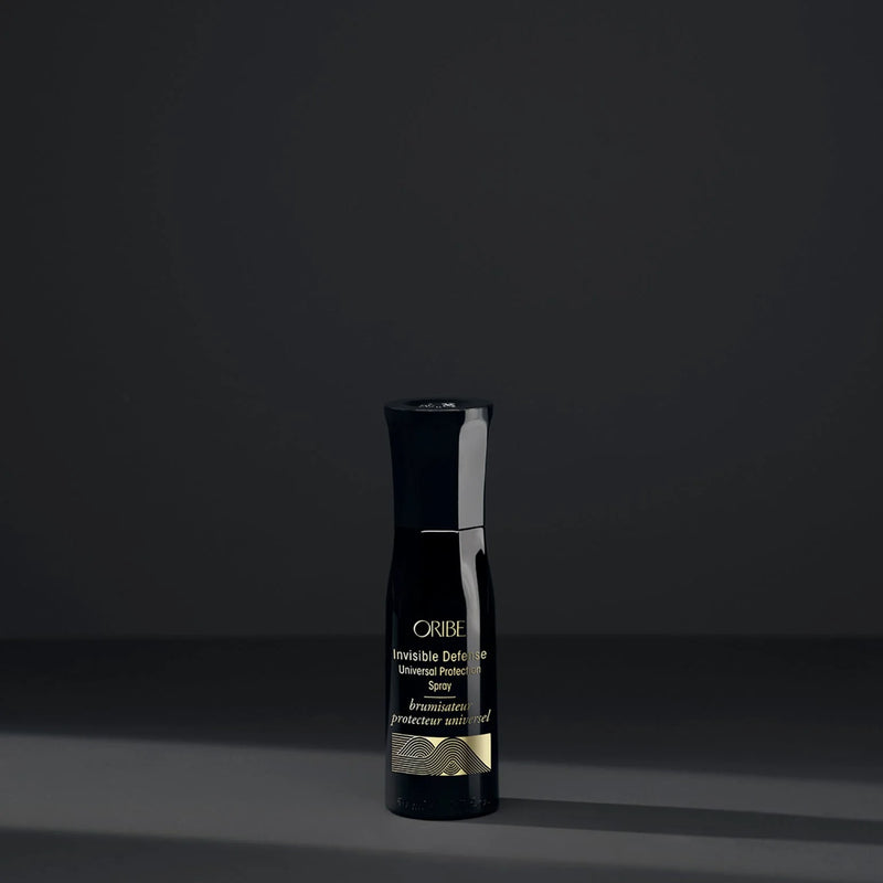 Oribe Invisible Defense Universal Protection Spray – weightless mist that shields hair from heat up to 450 °F, UV rays and pollution while adding lightweight moisture and reducing frizz.