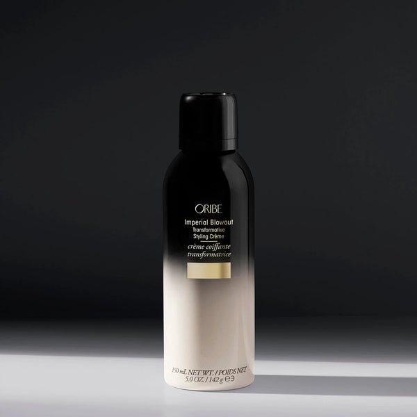 Oribe Imperial Blowout Transformative Styling Crème in gold tube with regal accents — a luxurious, multi-benefit styling cream that smooths, strengthens, and adds volume for a full, youthful blowout effect.