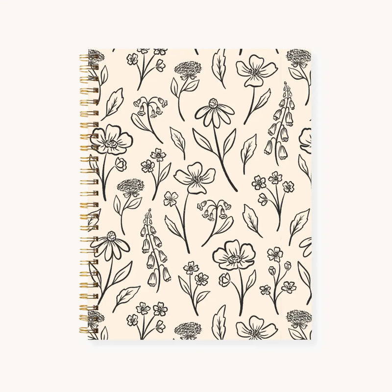 Elyse Breanne Design Pressed Floral Hardcover Spiral Notebook 7x9 – eco-friendly journal with black pressed flower illustrations, gold twin-ring binding, 144 college-ruled pages for writing, journaling, or note-taking.
