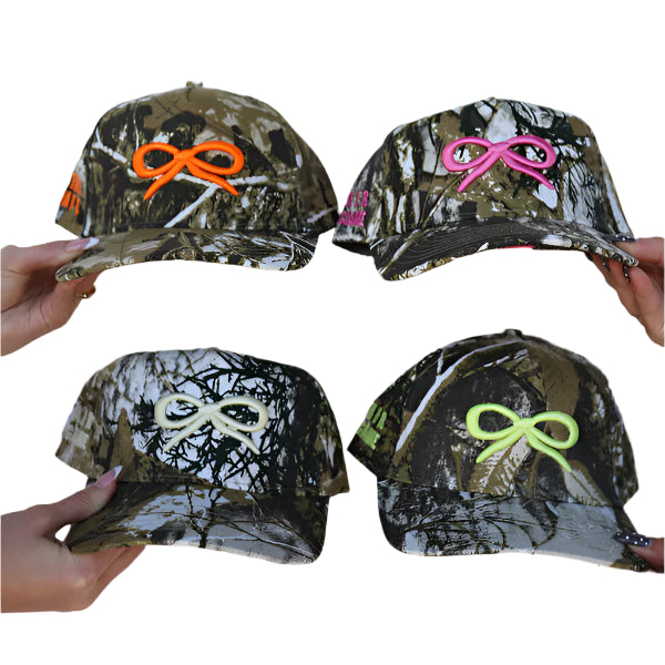 KAXI Camo Bow Trucker Hat – Adjustable Snapback Cap with Mesh Back and Feminine Bow Detail for Casual or Active Style.