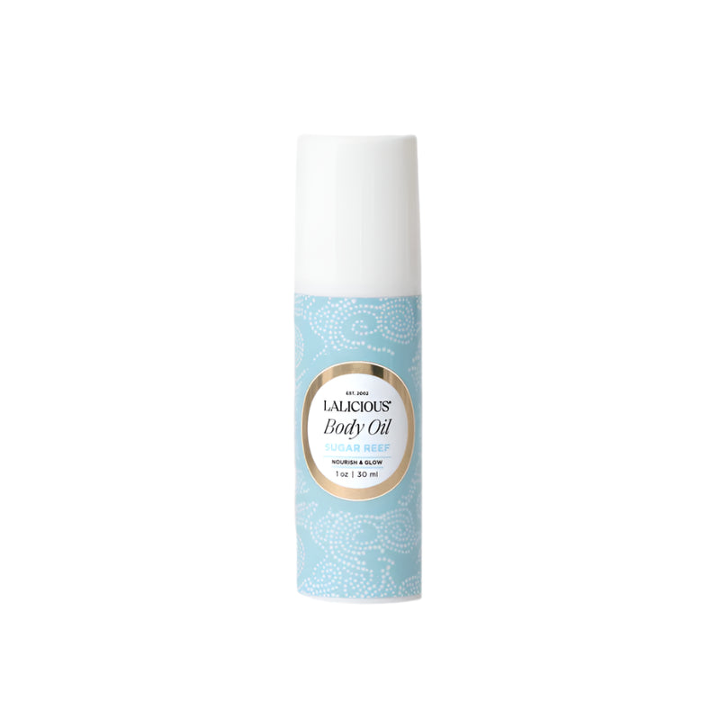 Lalicious Body Oil 1 oz in Sugar Reef – refreshing aquatic body oil with notes of citrus, coconut, and sea spray for beachy vibes. Deeply hydrating for dry skin that seeks radiance.