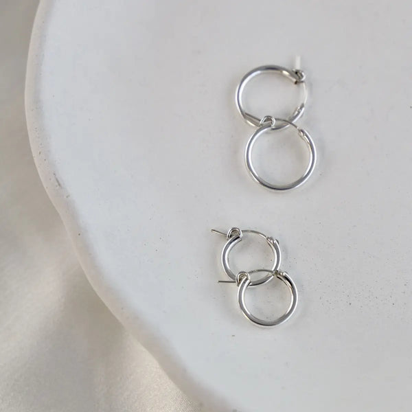 Katie Waltman silver standard hoop earrings, classic minimalist silver hoops for everyday wear.