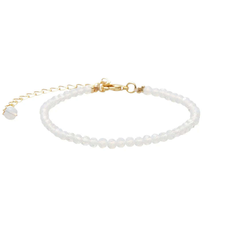 Lotus & Luna Intuition 3 mm healing bracelet – moonstone beads with gold accents on adjustable bracelet.