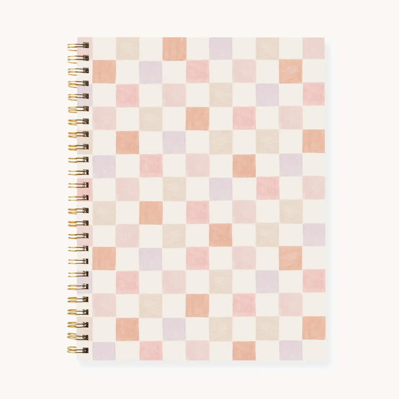Elyse Breanne Design 7x9 Hardcover Spiral Notebook Watercolor Checker – pastel pink, peach, and lavender checkerboard journal with gold spiral binding, 144 college-ruled pages.