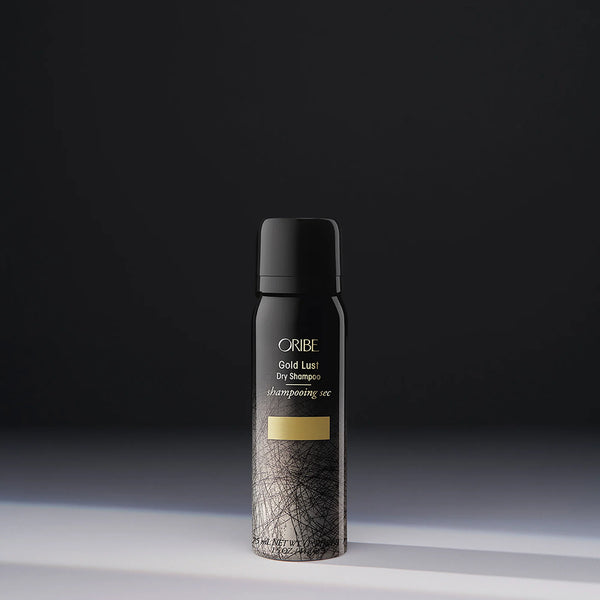 Oribe Gold Lust Dry Shampoo travel size – translucent dry shampoo spray that absorbs oil, odor and buildup without adding weight or texture, nourishes and strengthens hair.