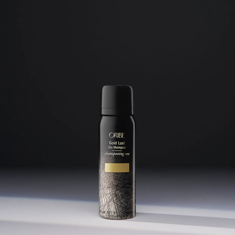 Oribe Gold Lust Dry Shampoo travel size – translucent dry shampoo spray that absorbs oil, odor and buildup without adding weight or texture, nourishes and strengthens hair.