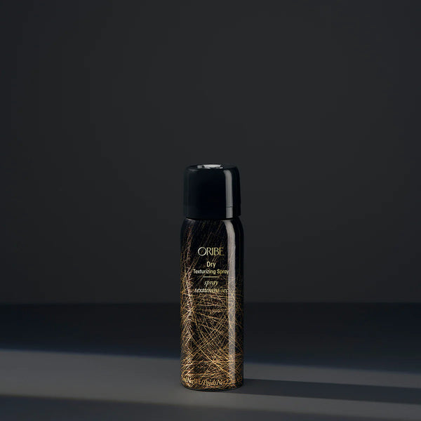 Oribe Travel Size Dry Texturizing Spray 2.2 oz – invisible dry hair spray for volume, texture, and oil absorption, luxury travel-friendly styling product.