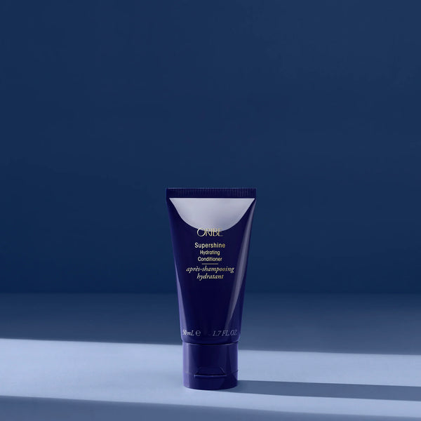 Oribe Supershine Hydrating Conditioner travel size for intense moisture and shine, ideal for dry or frizzy hair.
