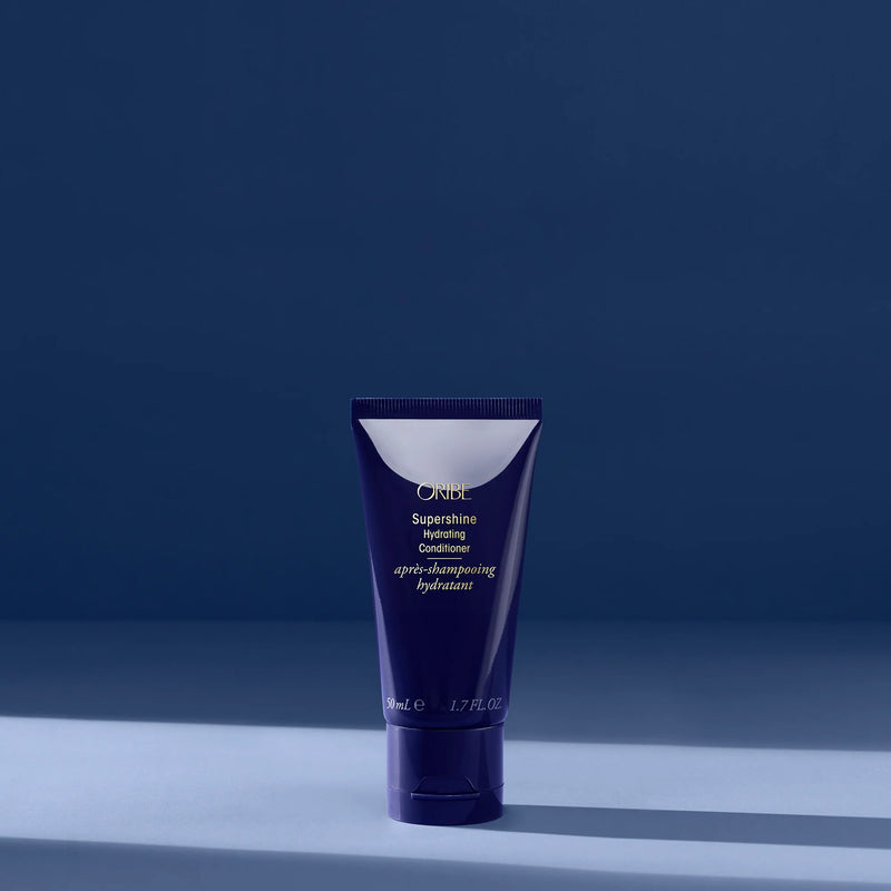 Oribe Supershine Hydrating Conditioner travel size for intense moisture and shine, ideal for dry or frizzy hair.