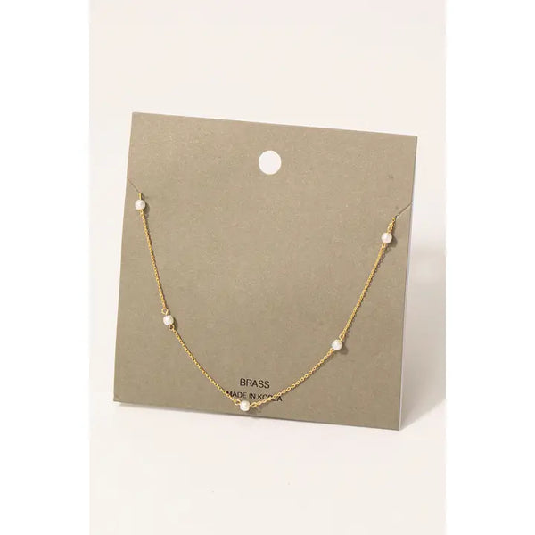 This mini floating pearl necklace with a dainty chain, delicate pearls suspended gives an elegant, minimalist look.