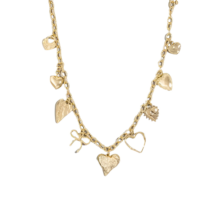 A fun and beautiful charm necklace, featured on a slightly hammered chain, giving it a unique vibe. The trending versatile hearts and ribbons spaced throughout makes it a great option for a dressed up sophisticated look, or a casual style. 