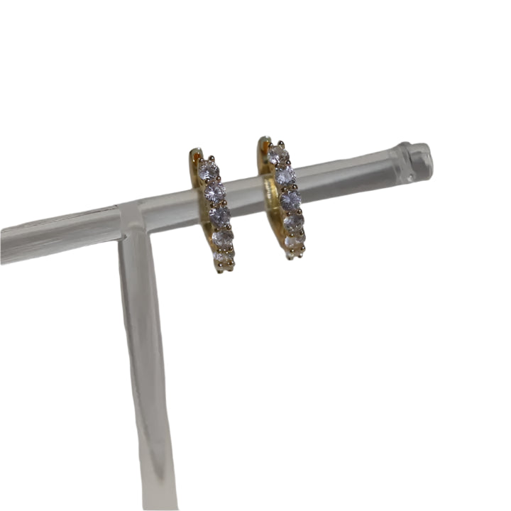 Katie Waltman Élan Hoop Earrings featuring medium-sized, gold-plated open hoops with a sculptural, curved silhouette — modern, lightweight, and perfect for adding a refined statement to any outfit.