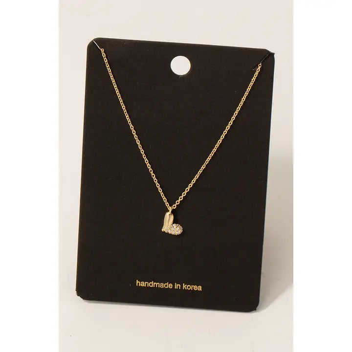 This half CZ pave heart pendant necklace, featured in gold plated, sparkling cubic zirconia stones on delicate chain, elegant and romantic jewelry, yet still simple and dainty.