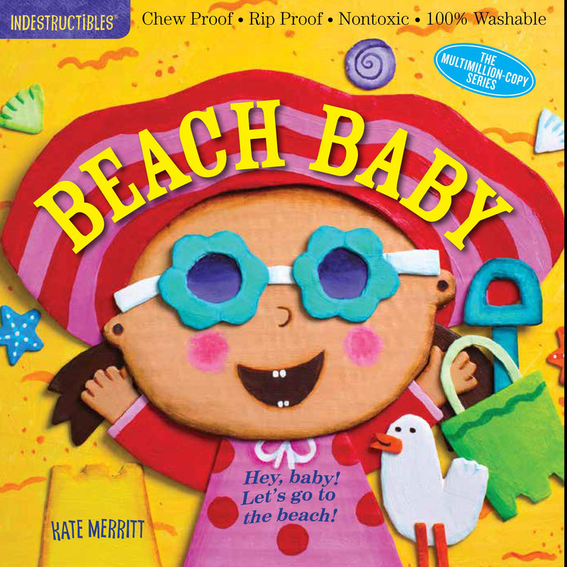 Indestructibles Beach Baby board book – chew‑proof and washable baby book about a day at the beach with bright illustrations of sand, shells, bucket and shovel.