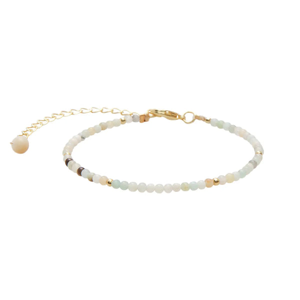 Lotus & Luna Inner Peace 2 mm healing bracelet – amazonite bead bracelet with gold accents on adjustable chain.