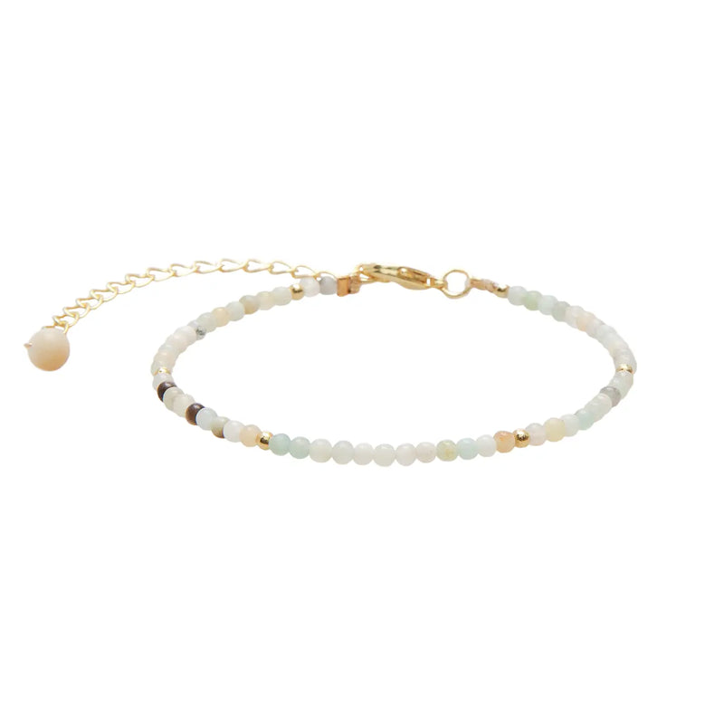 Lotus & Luna Inner Peace 2 mm healing bracelet – amazonite bead bracelet with gold accents on adjustable chain.