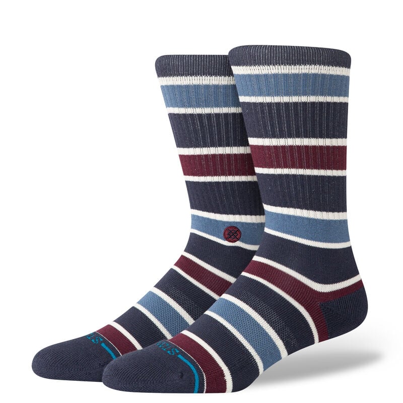 Stance Cotton Crew Socks in Devon-Navy — medium cushion crew-length socks made with soft combed cotton, featuring a supportive arch band, seamless toe, and a striped pattern in navy, rust, and neutral tones.