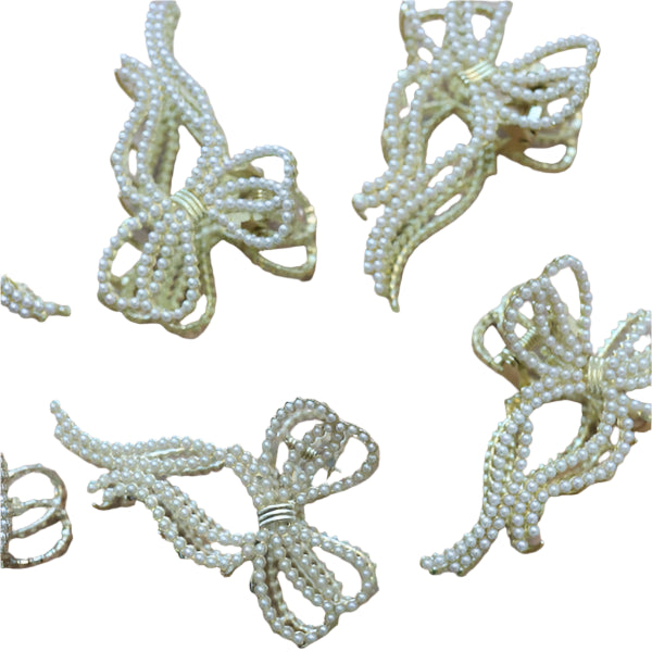 Feminine pearl and bow hair claw clip from Kaxi vintage-style bow claw for thick hair and everyday romantic looks.