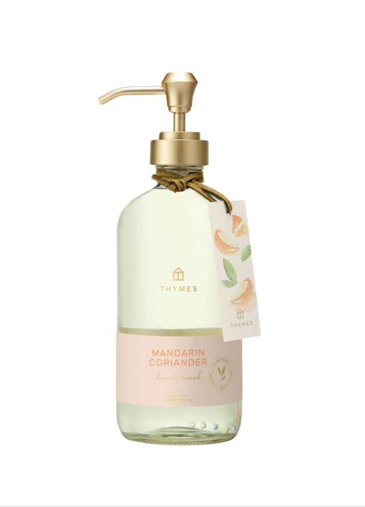 Thymes Mandarin Coriander Large Glass Hand Wash, an elegant hand cleanser in a beautifully designed glass bottle. Infused with a refreshing blend of citrus and herbal notes, this luxurious hand wash effectively cleanses and nourishes, leaving hands soft, smooth, and lightly scented. Perfect for stylish and functional bathroom or kitchen use and makes for a great gift that everyone is sure to love.