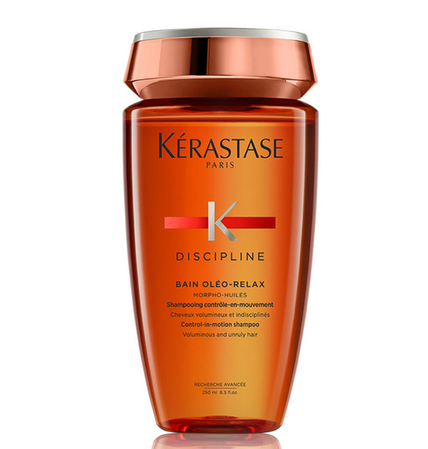 Smoothing anti-frizz shampoo by Kérastase professional for dry, rebellious hair. Infused with coconut oil to create smoothness. It reduces tangle in the hair as well.
