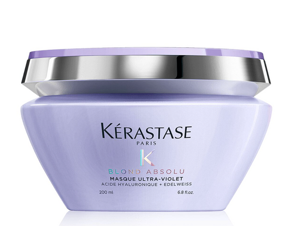 Infused with hyaluronic acid, the Blond Absolu Ultra-Violet Masque is an anti-brass purple mask by Kérastase for brightening blonde and gray hair.