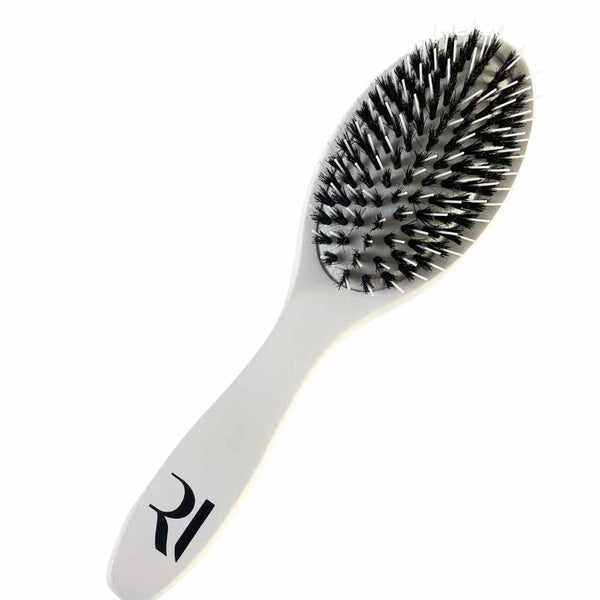 A Professional-grade double-bristle brush by Racoon International – gentle on natural and extension hair. Smooths and detangles. 