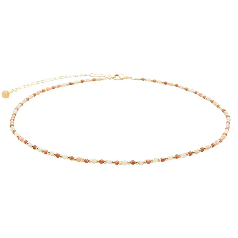 Lotus & Luna Joy + Stability 2 mm Healing Necklace – pink aventurine and sandstone beads on adjustable gold-plated chain.