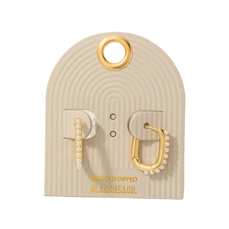 Pearl Studded Rectangle Hoop Earrings. These are an Elegant rectangular hoop earrings featuring lustrous pearl accents for a sophisticated, chic look. Excellent for adding a touch of timeless elegance to any outfit, these versatile earrings are ideal for both everyday wear and special occasions.