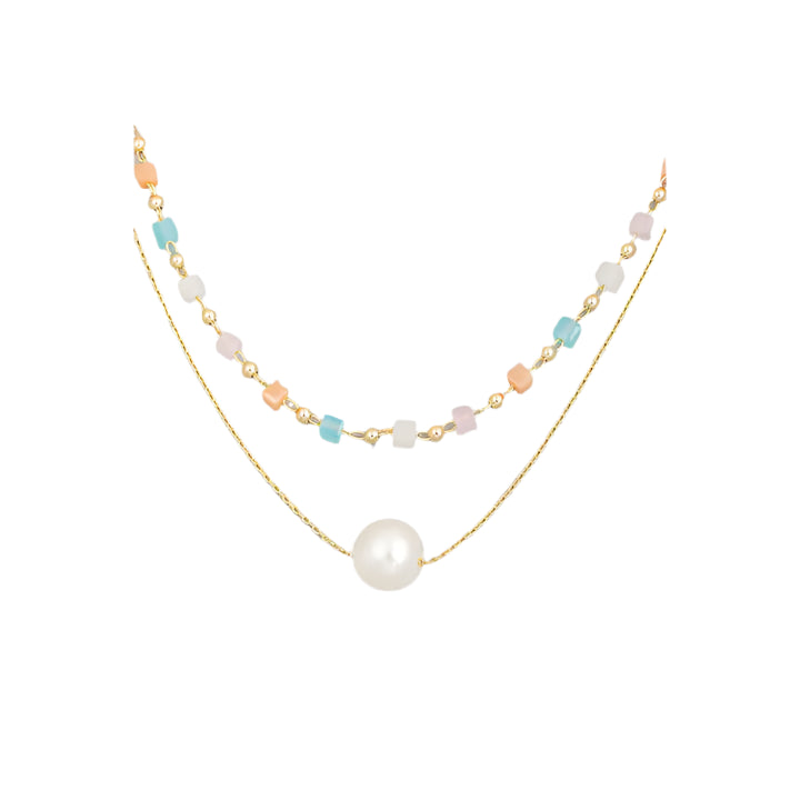 The Pastel Beaded Layered Pearl Ball Necklace – Elegant Multi-Layer Necklace with Soft Pastel Beads & A Pearl in the center of a simple chain. This necklace gives stunning, light, and costal boho vibes. Chic & Timeless Jewelry for Everyday Wear & Special Occasions.