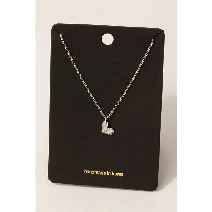 This half CZ pave heart pendant necklace, featured in silver, sparkling cubic zirconia stones on delicate chain, elegant and romantic jewelry, yet still simple and dainty.