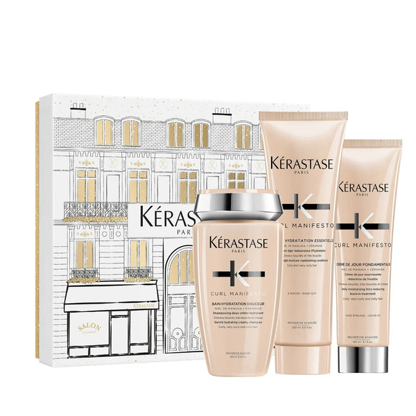 Kerastase Curl Manifesto Holiday Gift Set with Bain Hydration Douceur Shampoo, Fondant Conditioner and Creme de Jour Leave-In for curly and coily hair hydration and definition.