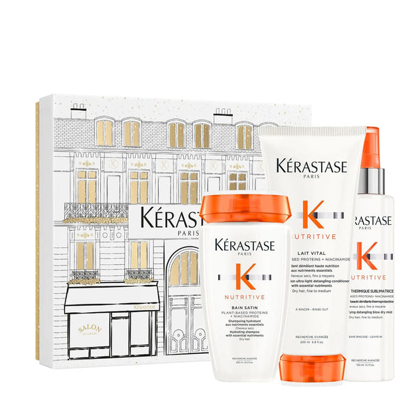 Kerastase Nutritive Holiday Gift Set with Bain Satin Shampoo, Lait Vital Conditioner and Thermique Sublimatrice Heat Protectant for nourishing dry hair with essential nutrients.