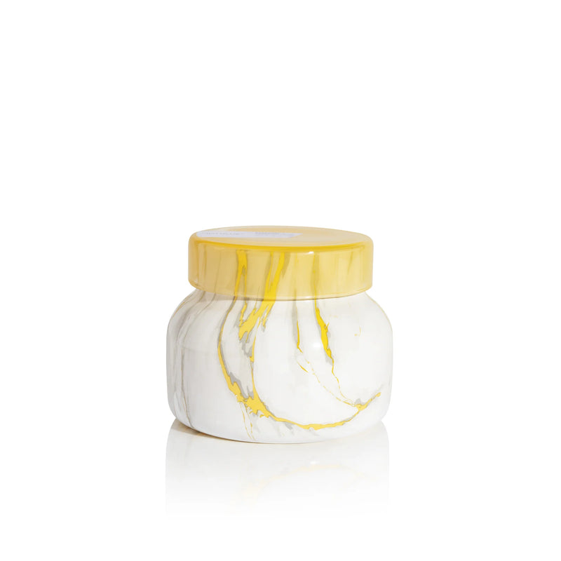 From Capri Blue in the scent Pineapple Flower Petite Candle, this is an 8 oz modern marble jar with tropical pineapple, jasmine, and citrus fragrance, luxury home scent or gift candle.