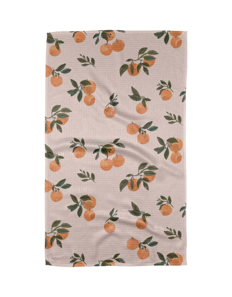 Geometry Kitchen tea towel in Pretty in Peach – soft solid peach-colored microfiber towel with waffle‑weave, quick‑dry fabric and convenient hang loop.