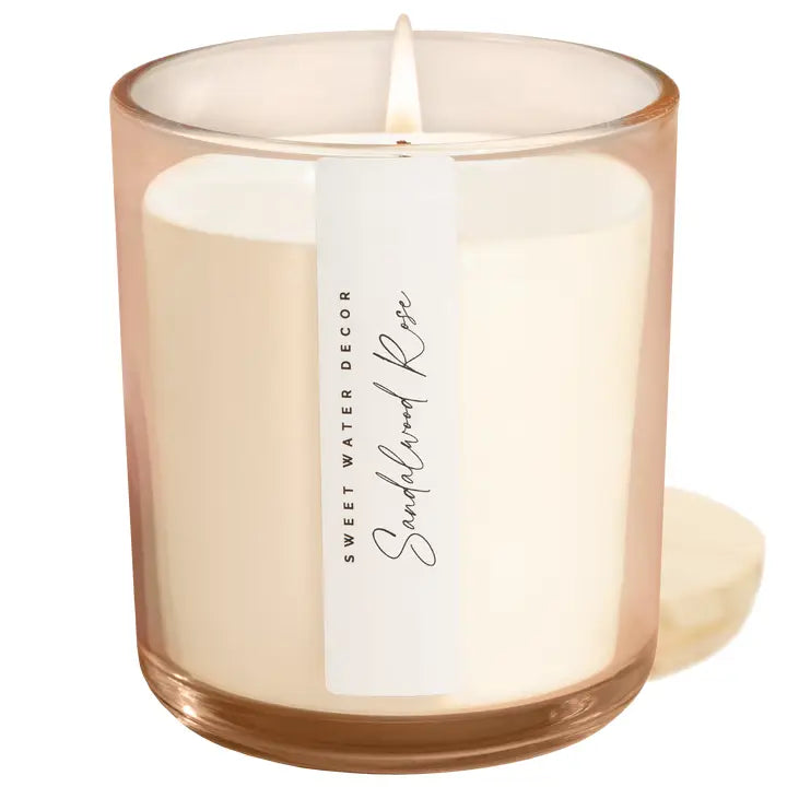 Hand-poured Sandalwood Rose Candle by Sweet Water Decor - luxury scented soy wax candle. This candle is perfect for gifting or burning and displaying in your own home. Creates a calm, woodsy vibe. The perfect blend of elegance and complexity. 