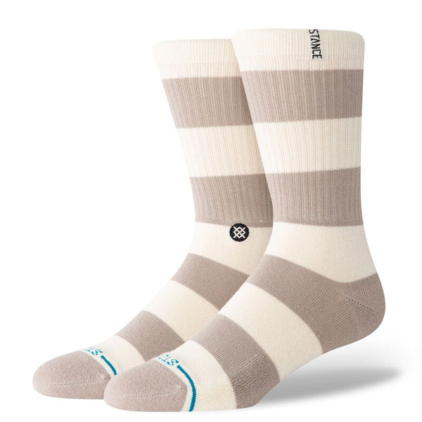 Stance Butter Blend™ Crew Medium Cushion Socks in the color way Stacked Up Stringed Grey. These socks are Soft, cushioned crew socks crafted with Stance's signature Butter Blend™ fabric for ultimate comfort. Features a medium cushion for all-day support, in a stylish grey color with stacked stripe pattern. Perfect for everyday wear or athletic activities. The butter blend is a very luxurious feel.